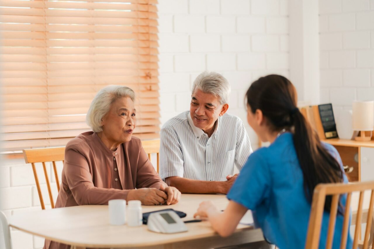 QHS carer supporting an elderly client at home