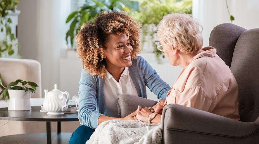 QHS carer providing homecare support at home