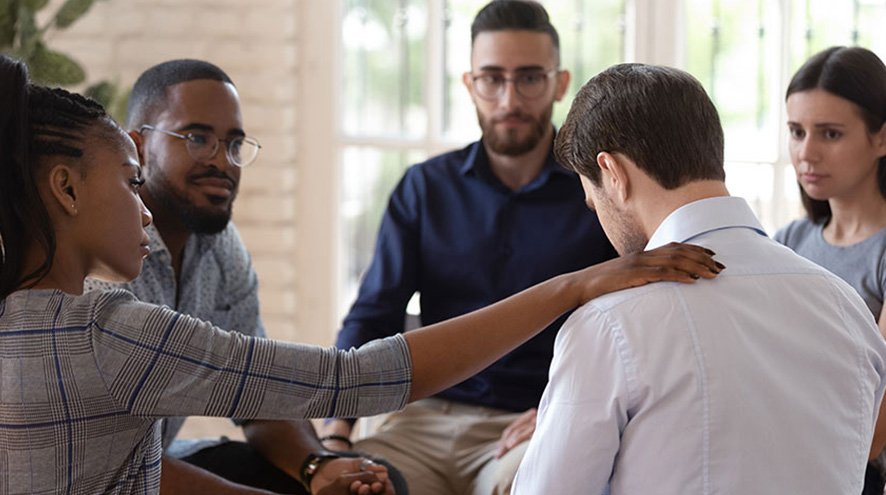 QHS carer supporting a client's rehabilitation at home