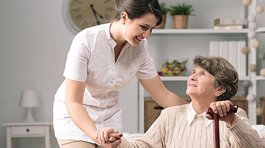 QHS sit-in carer with client