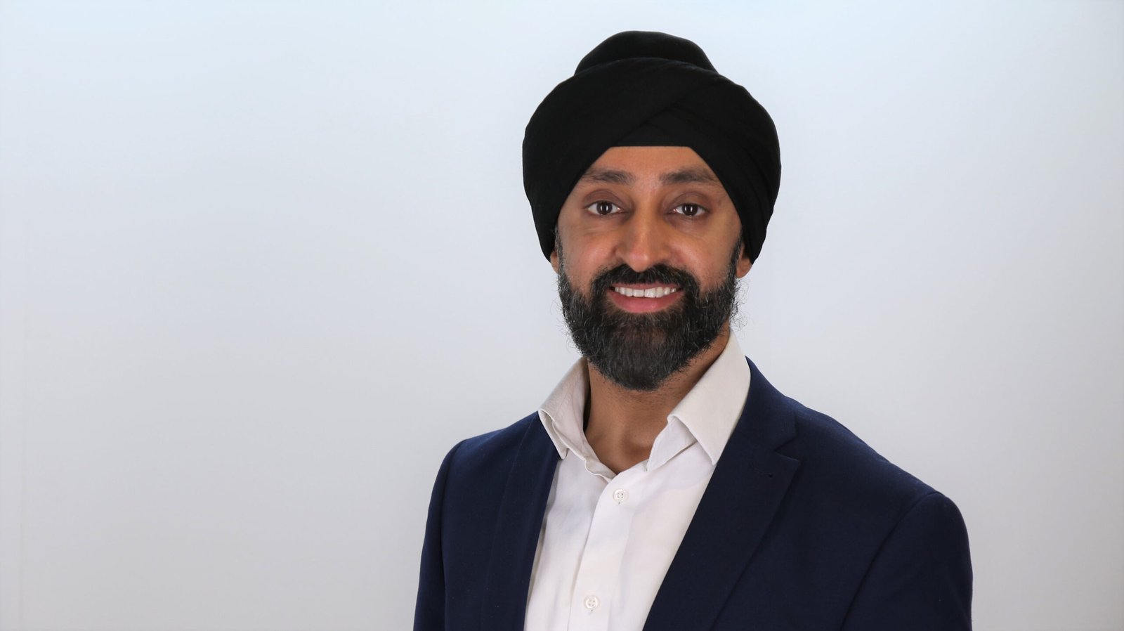 Tajinder Bains, Managing Director at QHS